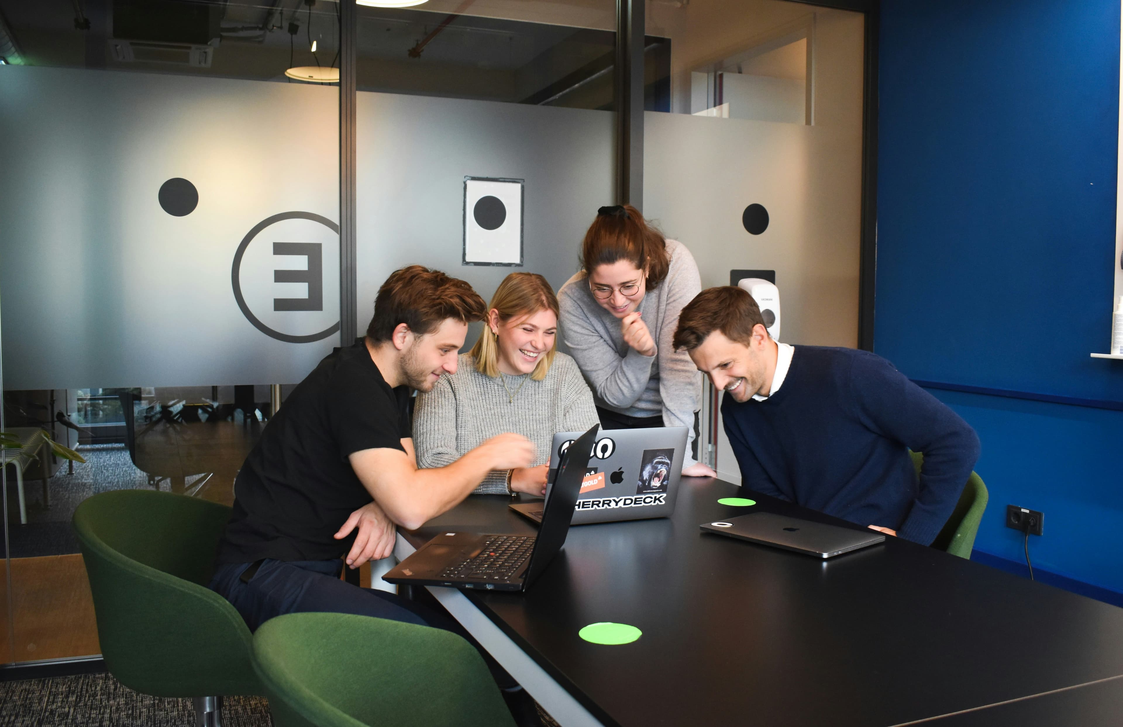 Snora team collaborating in a meeting room