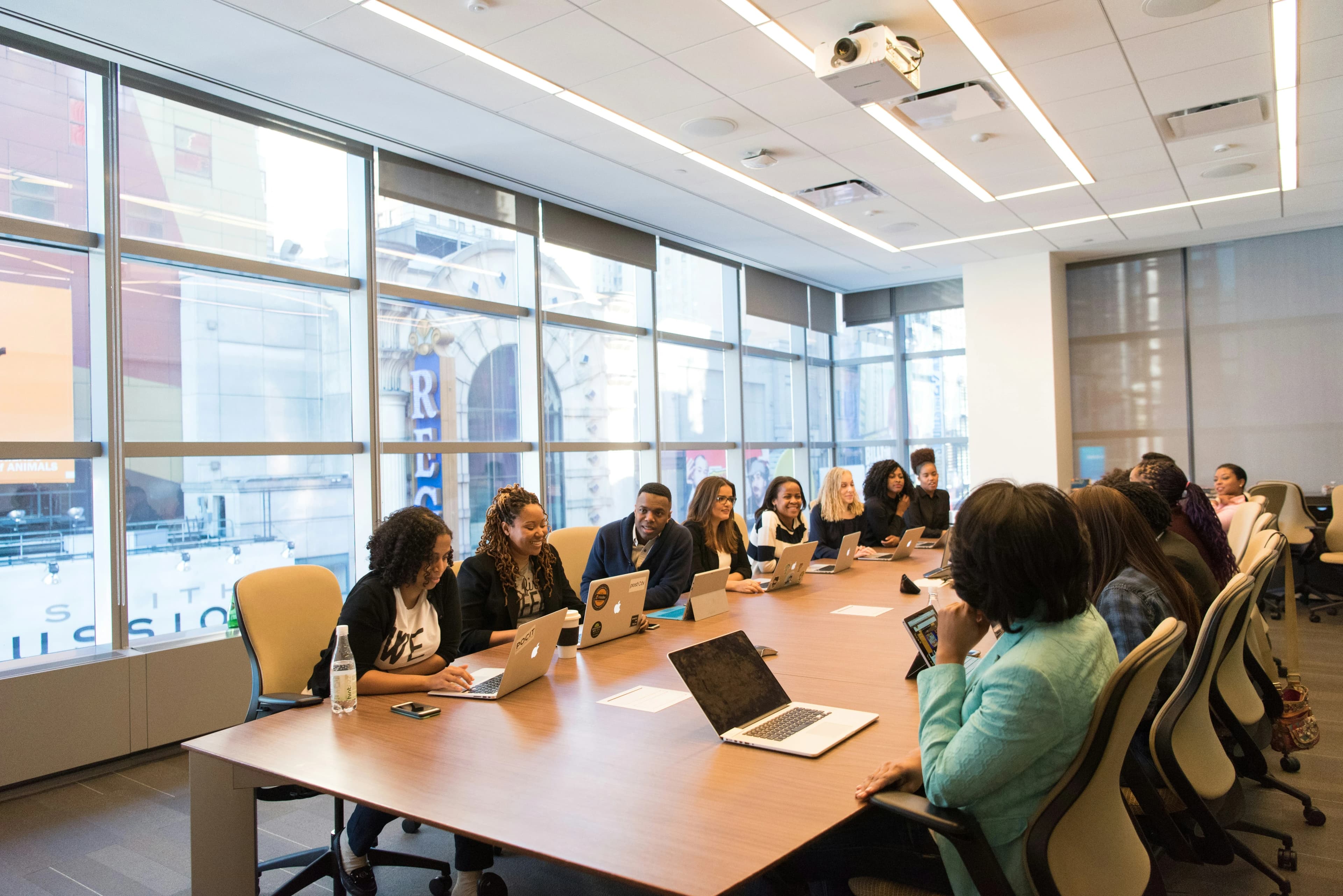 Leadership team reviewing predictive analytics insights
